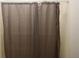 Shower includes modern grey shower curtain and rod at 1199 Ashborough Se Dr # K, Marietta, GA 30067