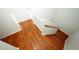 Staircase with wooden stairs and white railings at 1199 Ashborough Se Dr # K, Marietta, GA 30067
