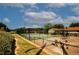 Tennis courts and playground surrounded by well-manicured green space at 1199 Ashborough Se Dr # K, Marietta, GA 30067