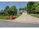 Inviting home with well-kept lawn, landscaping, and 2 car garage at 1391 Sutters Dr, Lawrenceville, GA 30045