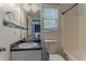 Bright bathroom with a tiled shower and modern fixtures at 441 Amy Blvd, Temple, GA 30179