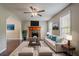 Bright and inviting living room with a fireplace, neutral decor, and lots of natural light at 441 Amy Blvd, Temple, GA 30179