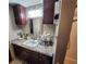 Updated bathroom with granite counter, modern cabinets, and bath tub at 6290 S Skyline Dr, Douglasville, GA 30135