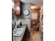 Bathroom with granite counter, modern cabinets, and ceramic tile at 6290 S Skyline Dr, Douglasville, GA 30135