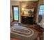 Cozy living room with fireplace and hardwood floors at 6290 S Skyline Dr, Douglasville, GA 30135