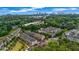 Wide aerial shot showcasing a residential area surrounded by dense trees with the city skyline visible in the distance at 1120 Cordia Nw Ave, Atlanta, GA 30318
