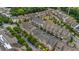 Aerial view of the community showcasing the well-maintained townhomes, lush landscaping, and convenient street parking at 1120 Cordia Nw Ave, Atlanta, GA 30318