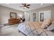 Bedroom showcases a work desk, dresser, and patterned bedding at 1120 Cordia Nw Ave, Atlanta, GA 30318