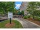 Well-maintained dog park with secure fencing and shady trees provides a dedicated space for residents' pets to play at 1120 Cordia Nw Ave, Atlanta, GA 30318