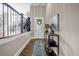 Inviting foyer with hardwood floors, elegant lighting and a view of the stairs and living areas beyond at 1120 Cordia Nw Ave, Atlanta, GA 30318