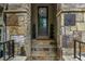 Charming doorway with natural stone steps and pillars, decorative wreath and clear numbering for address visibility at 1120 Cordia Nw Ave, Atlanta, GA 30318