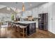Spacious kitchen features large island, ample cabinet space, stainless steel appliances, and hardwood floors at 1120 Cordia Nw Ave, Atlanta, GA 30318