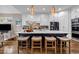 Bright and airy kitchen with a large island, ample cabinet space, stainless steel appliances, and hardwood floors at 1120 Cordia Nw Ave, Atlanta, GA 30318