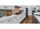 Modern kitchen features stainless steel appliances, white cabinets, and a gas cooktop at 1120 Cordia Nw Ave, Atlanta, GA 30318