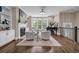 Cozy living room featuring fireplace, window seat, grand piano and four comfortable swivel chairs at 1120 Cordia Nw Ave, Atlanta, GA 30318