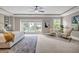 Spacious main bedroom with bay window, plush seating, and modern decor at 1120 Cordia Nw Ave, Atlanta, GA 30318