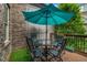 Outdoor patio featuring a table with umbrella, perfect for relaxing and entertaining at 1120 Cordia Nw Ave, Atlanta, GA 30318