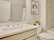 Bright bathroom with modern vanity, white countertops, and tiled shower at 3173 Rockbridge Rd, Avondale Estates, GA 30002