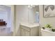 Modern bathroom featuring a vanity with sleek sink and fixtures, and neutral color palette at 3173 Rockbridge Rd, Avondale Estates, GA 30002