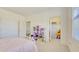 Bedroom with a dollhouse and a closet with easy accessibility at 3173 Rockbridge Rd, Avondale Estates, GA 30002
