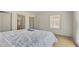 This bedroom features hard wood flooring and a view from the window at 3173 Rockbridge Rd, Avondale Estates, GA 30002