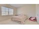 Bright bedroom featuring a large window and a comfortable-looking bed at 3173 Rockbridge Rd, Avondale Estates, GA 30002