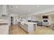 Bright kitchen features a large island, stainless appliances, and opens to the living area at 3173 Rockbridge Rd, Avondale Estates, GA 30002
