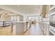 Open-concept kitchen featuring a large island, stainless appliances, and seamless flow to living areas at 3173 Rockbridge Rd, Avondale Estates, GA 30002