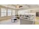 Bright open living space with a comfortable sectional sofa and modern finishes, connected to kitchen at 3173 Rockbridge Rd, Avondale Estates, GA 30002