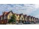 Retail shops with Tudor style architecture, red roofs, and off-street parking at 3173 Rockbridge Rd, Avondale Estates, GA 30002