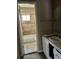 Bathroom featuring a shower and tub combo with coordinating tilework at 3298 Abbeywood Dr, Decatur, GA 30034