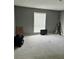 Neutral bedroom with great natural light featuring blinds and carpeting at 3298 Abbeywood Dr, Decatur, GA 30034