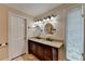 Elegant bathroom with double vanity, stylish mirrors, and natural lighting at 5025 Oak Bluff Ct, Atlanta, GA 30350