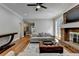 Living room with fireplace and access to hallway and outdoor patio at 5025 Oak Bluff Ct, Atlanta, GA 30350