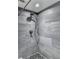 A modern shower with elegant gray tiles, adding a touch of sophistication and comfort at 5025 Oak Bluff Ct, Atlanta, GA 30350