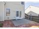 Concrete patio with french doors, offering easy access to the spacious backyard at 789 Clairidge Elm Sw Trl, Lawrenceville, GA 30046