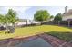 Backyard with grass, patio and fence at 789 Clairidge Elm Sw Trl, Lawrenceville, GA 30046