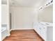 Bathroom boasting a double vanity and a separate tub and shower at 789 Clairidge Elm Sw Trl, Lawrenceville, GA 30046
