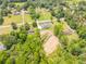 Wide aerial shot showcases the property and its surrounding landscape, perfect for a peaceful retreat at 140 Maranatha Trl, Lawrenceville, GA 30045