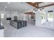 Modern kitchen features an island, stainless steel appliances, and marble countertops at 140 Maranatha Trl, Lawrenceville, GA 30045