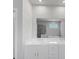 Bright bathroom featuring a soaking tub and double sink vanity at 212 Birchwood Row, Canton, GA 30115