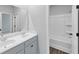 Bathroom featuring a double sink vanity and tub at 212 Birchwood Row, Canton, GA 30115