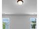 Bright bedroom with light grey paint and modern ceiling light at 212 Birchwood Row, Canton, GA 30115