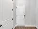 Mud room featuring a door to the outside and a closet for storage at 212 Birchwood Row, Canton, GA 30115