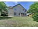 View of a large, well-maintained backyard with healthy grass and ample space at 25 Kaktovic Ct, Grayson, GA 30017