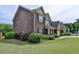 Beautiful two story brick home with well maintained landscaping and a welcoming front porch at 25 Kaktovic Ct, Grayson, GA 30017