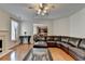 Bright living room with fireplace and seamless access to the kitchen area at 25 Kaktovic Ct, Grayson, GA 30017