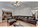 Open living space featuring hardwood floors and a glimpse into the adjacent kitchen at 25 Kaktovic Ct, Grayson, GA 30017