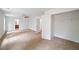 Large primary bedroom with neutral carpet, ceiling fan, and en-suite bathroom at 2714 Eagles Crest Ln, Decatur, GA 30034