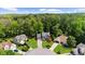 Beautiful aerial view of a home in a lush, green neighborhood at 2865 Ivey Oaks Ln, Roswell, GA 30076